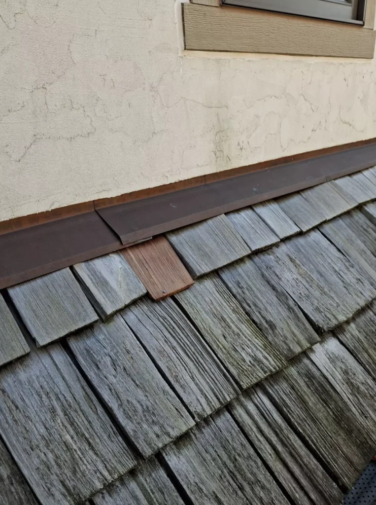 Copper step flashing